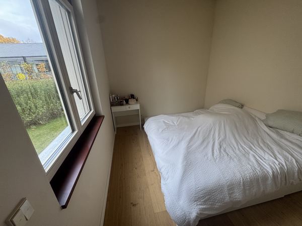 Master bedroom: window towards the garden with dressing table
